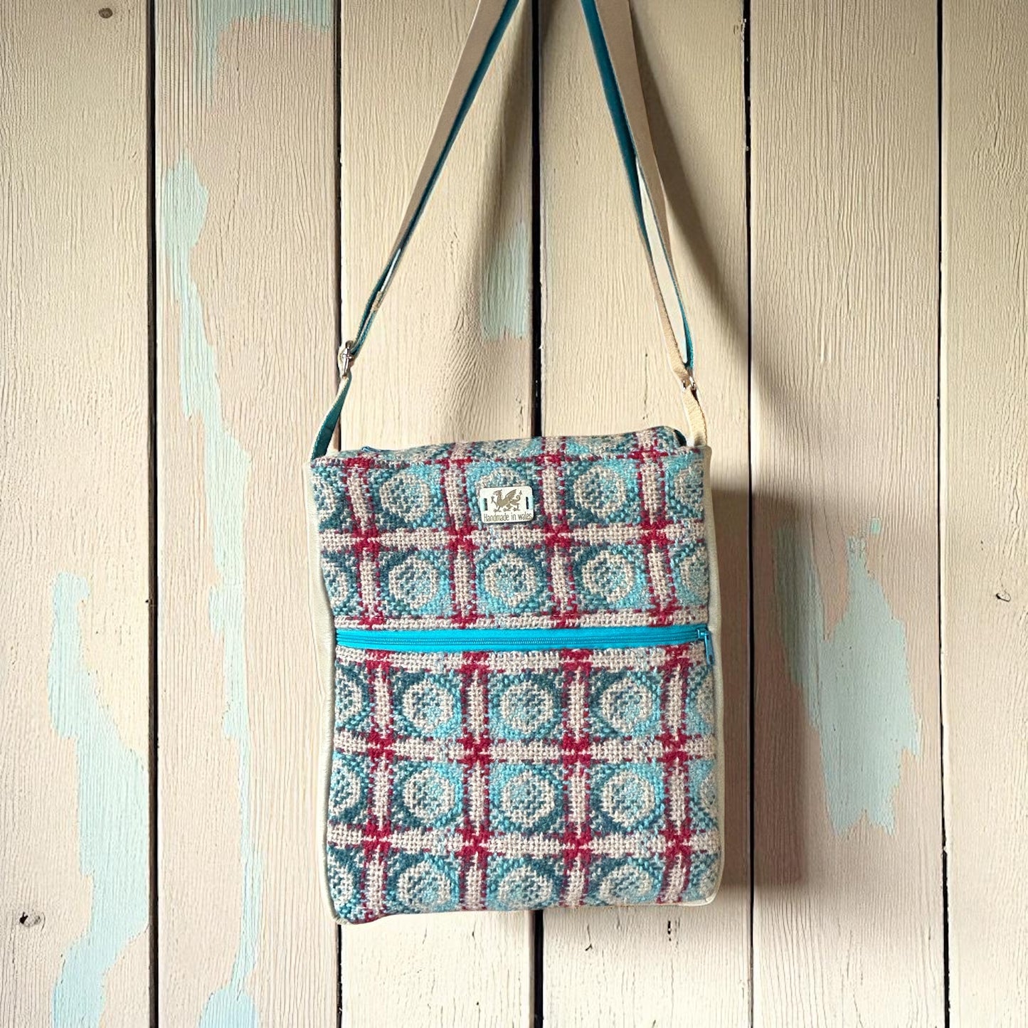 Upcycled Wool mix shoulder bag with leather sides and base