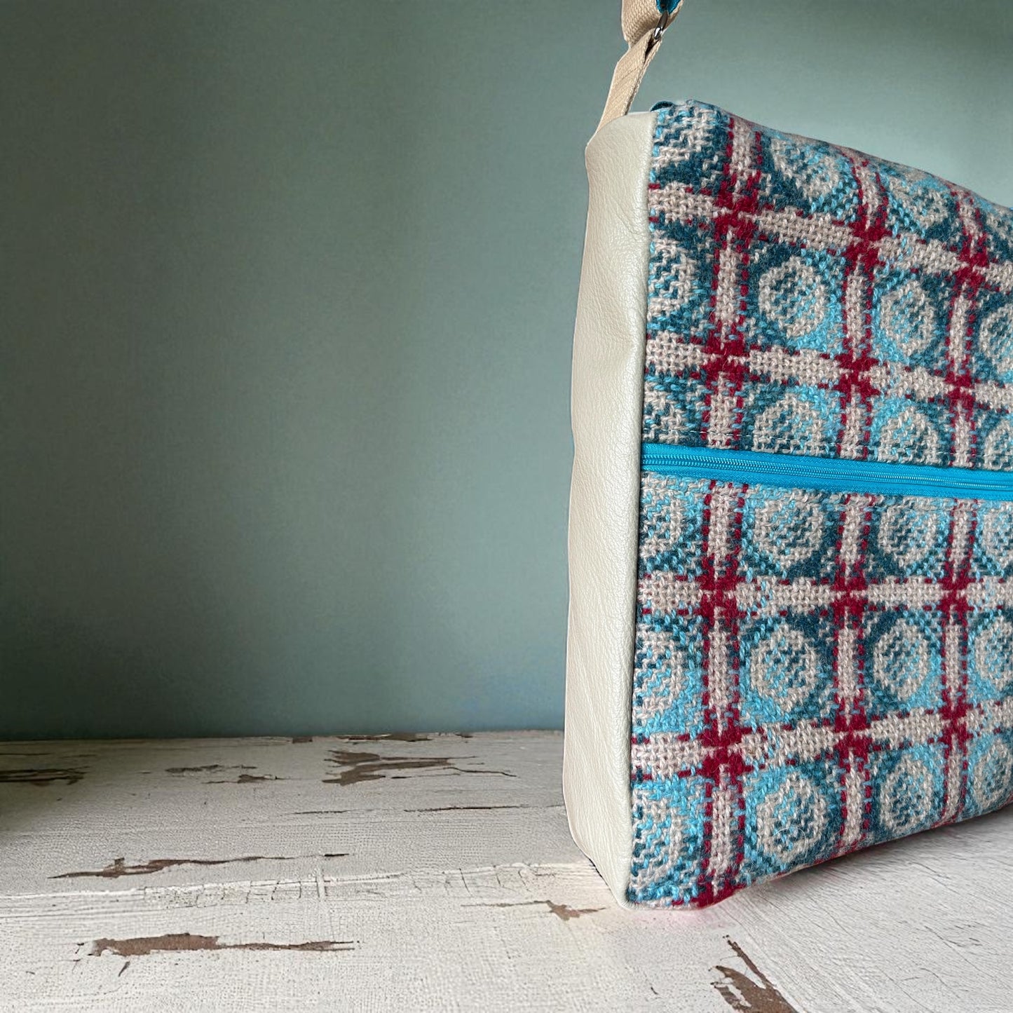 Upcycled Wool mix shoulder bag with leather sides and base