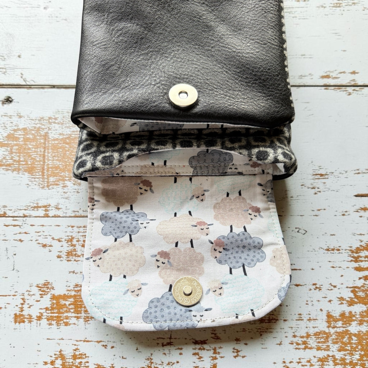 The Melindwr mini phone bag in real leather and upcycled wool