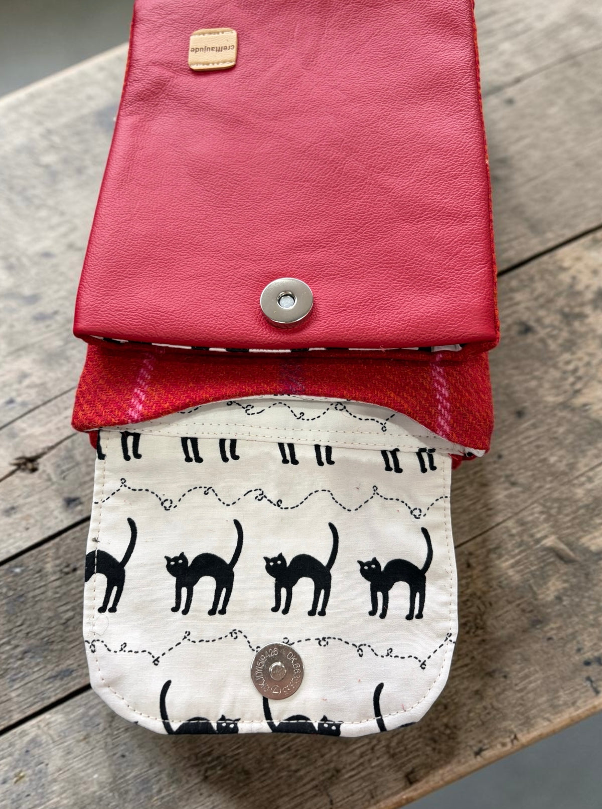 The Melindwr mini phone bag in leather and wool