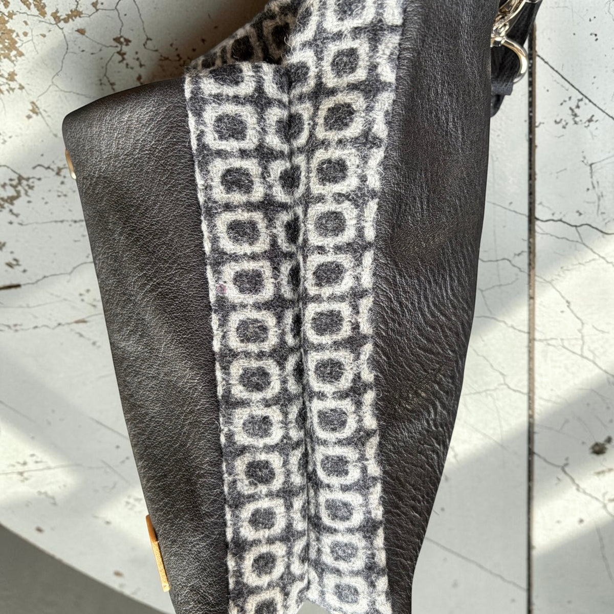 The Melindwr mini phone bag in real leather and upcycled wool
