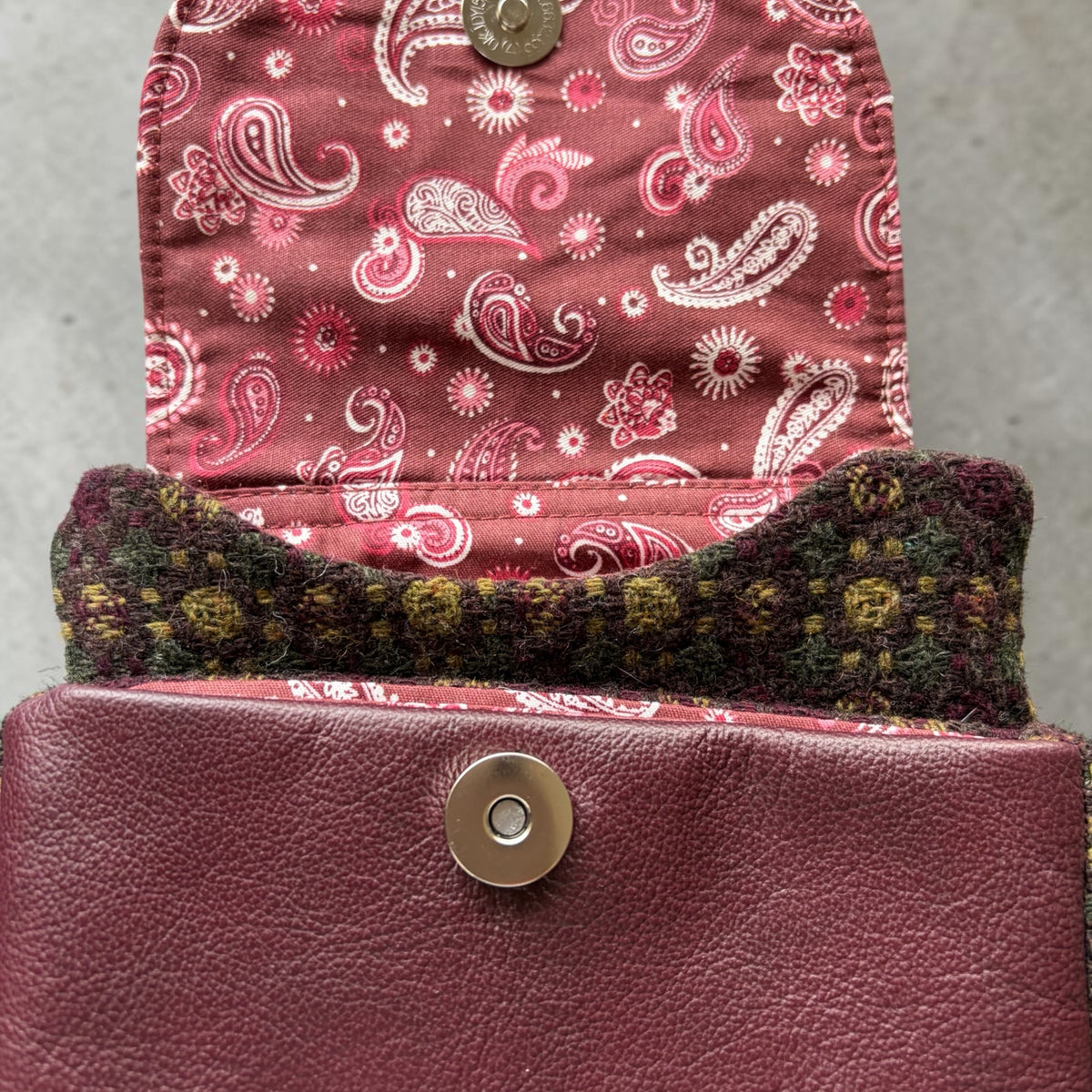 The Melindwr mini phone bag in real leather and upcycled wool