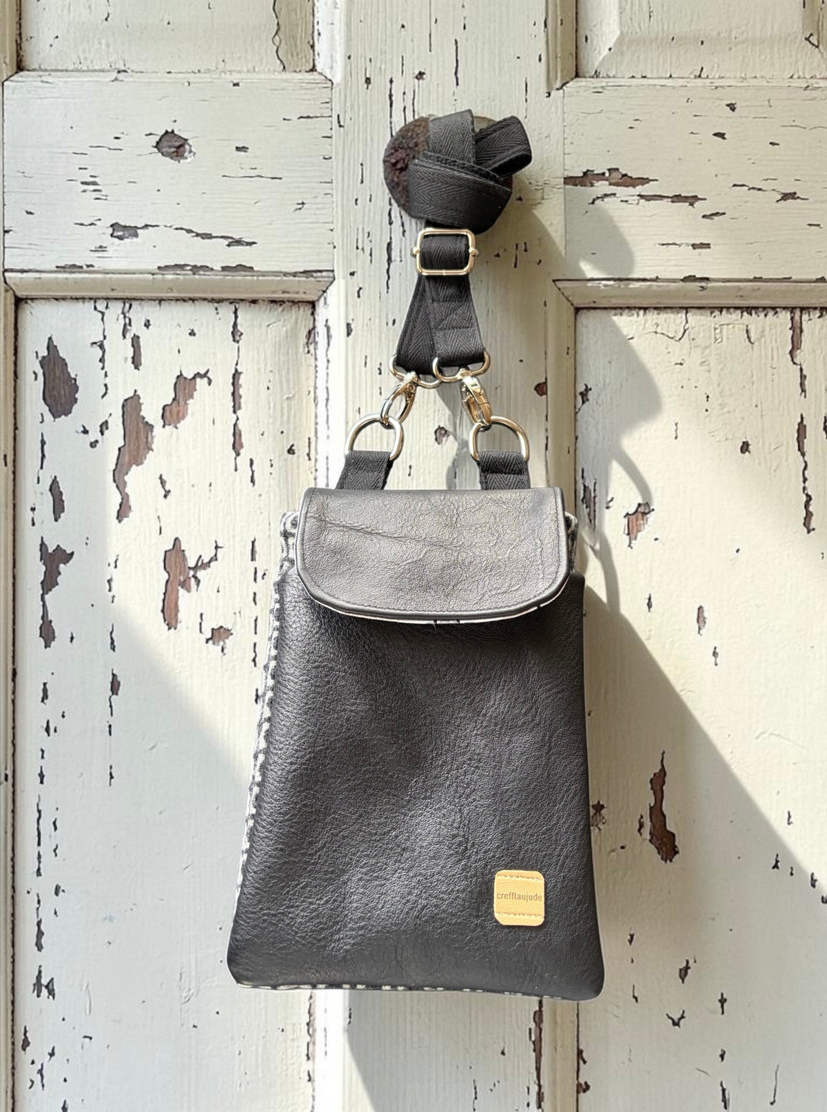 The Melindwr mini phone bag in real leather and upcycled wool
