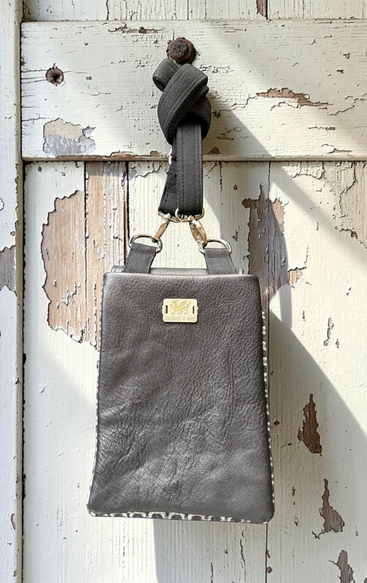 The Melindwr mini phone bag in real leather and upcycled wool